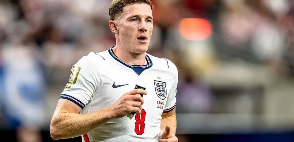 England player running on the field during match