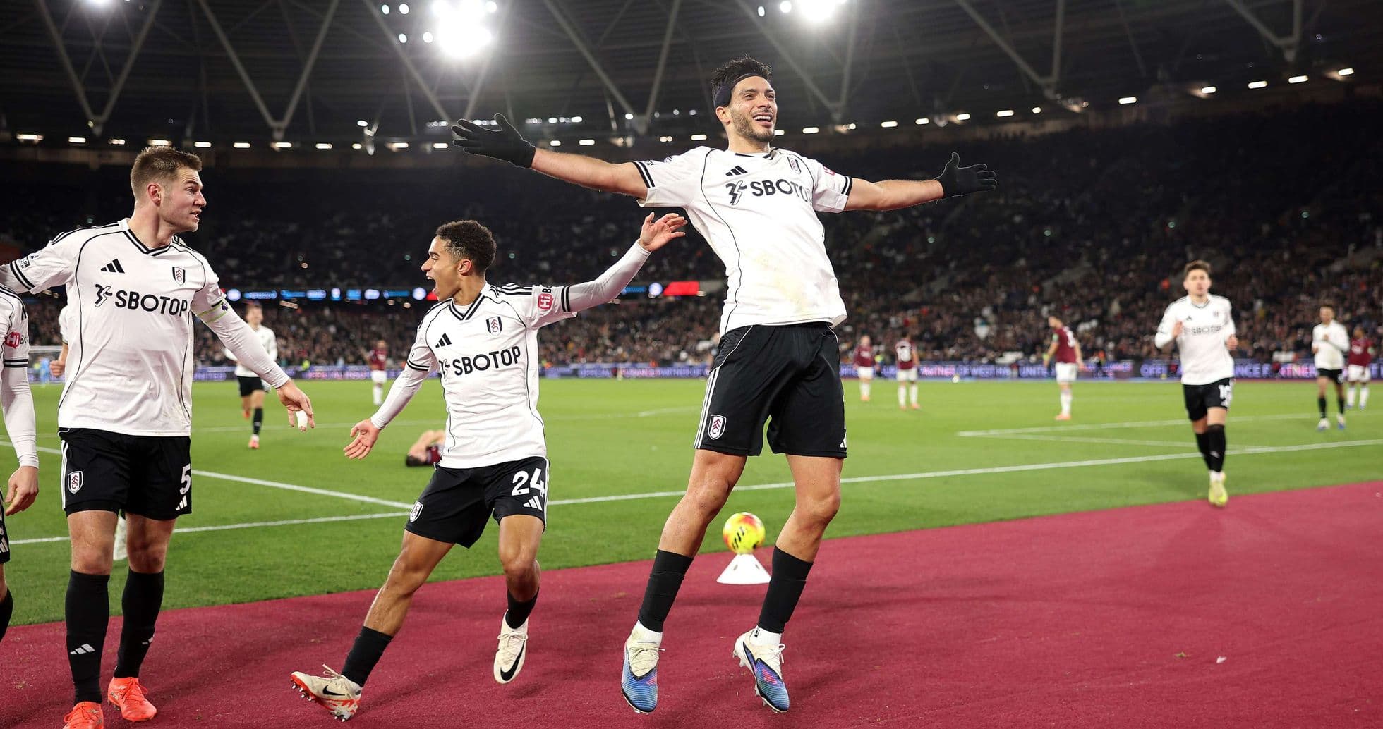 Fulham players celebrating a goal during match