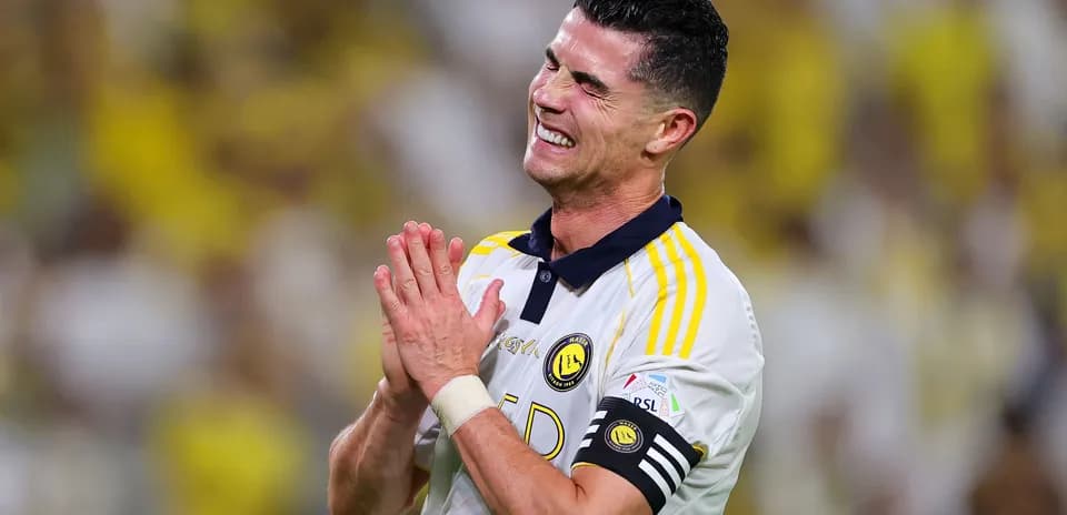 Player celebrating in team jersey during match