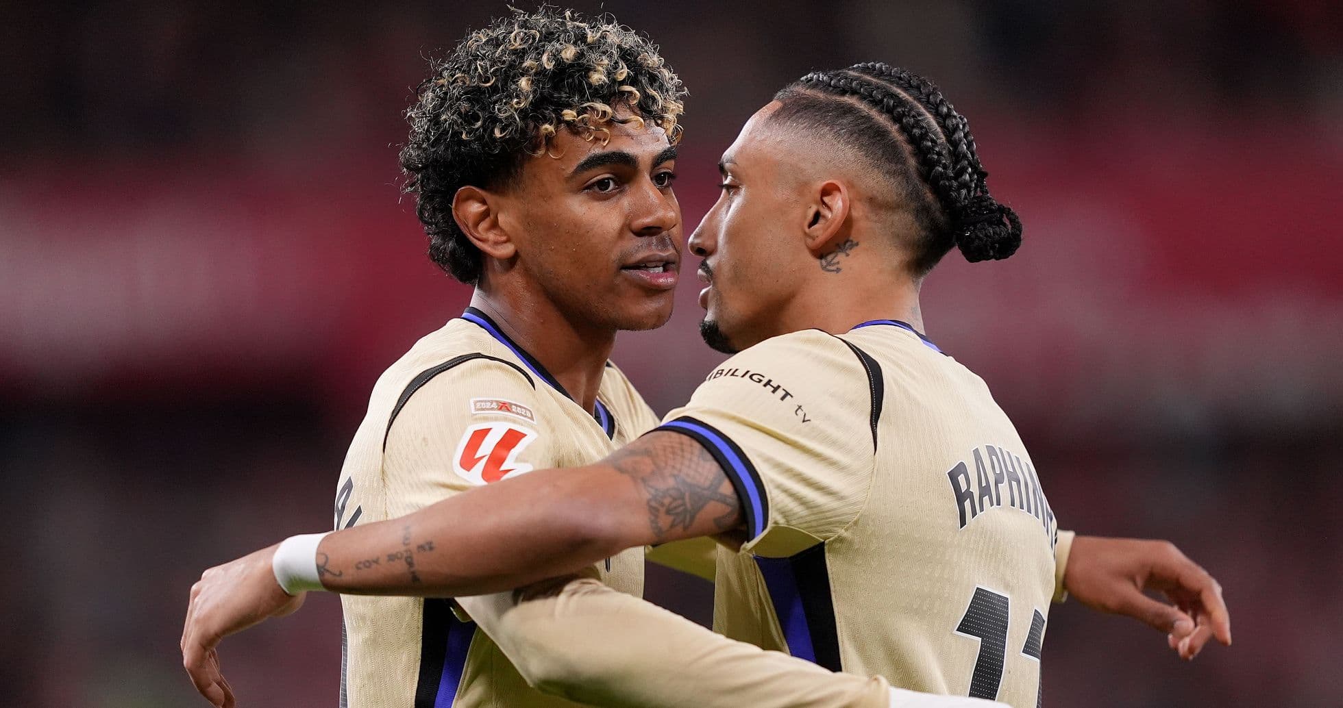 Two players embracing during a match celebration