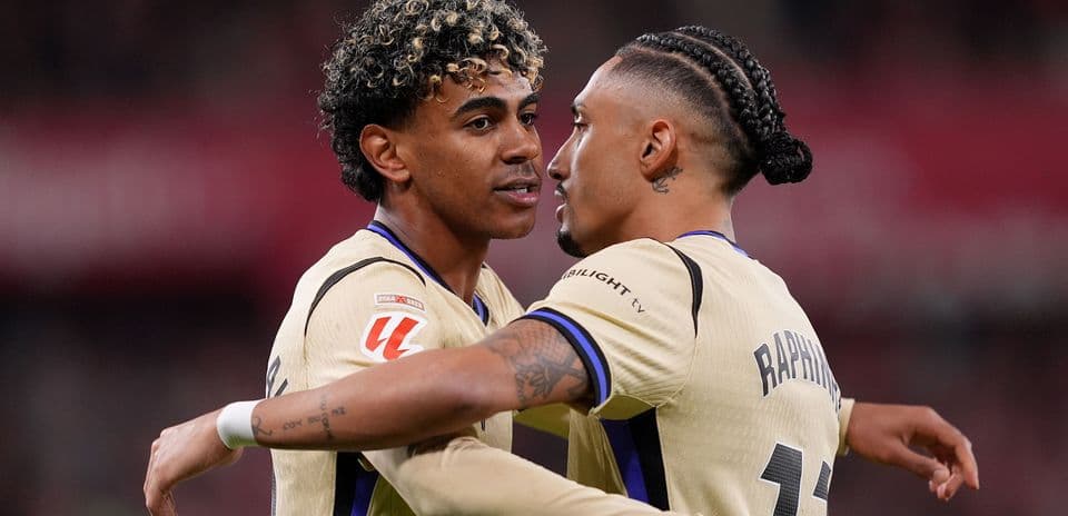 Two players embracing during a match celebration