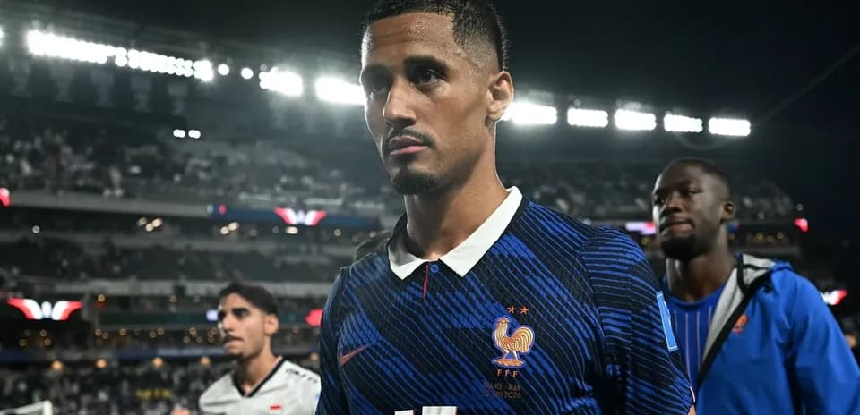 Player wearing France jersey walking off the field