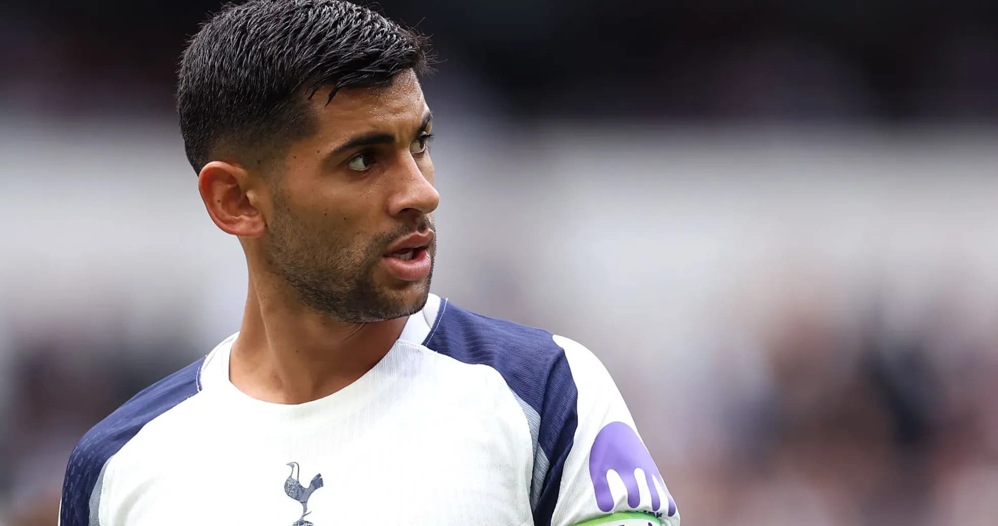 Player wearing Tottenham kit during match