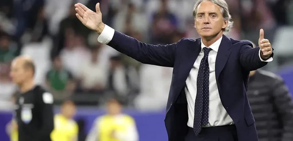 Coach gesturing during match from the sidelines