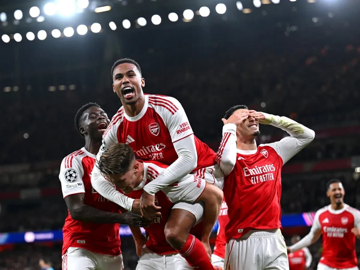 Arsenal players celebrating during Champions League match