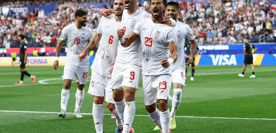 Iran team celebrating a goal during match