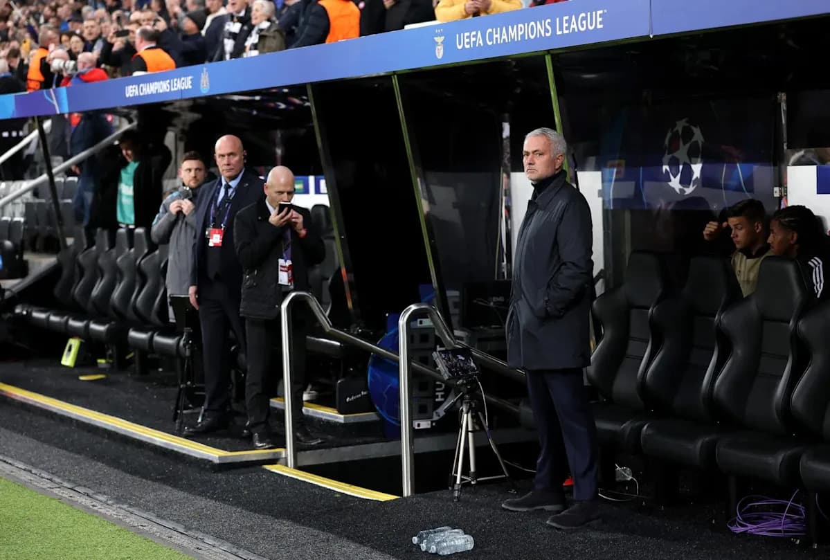 Manager observing from the technical area during match