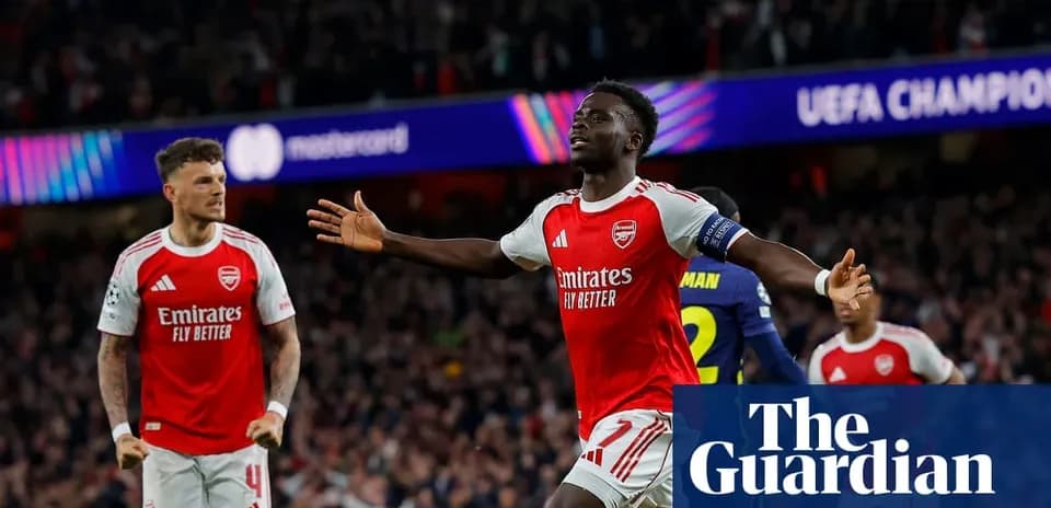 Arsenal players celebrating during UEFA Champions League match