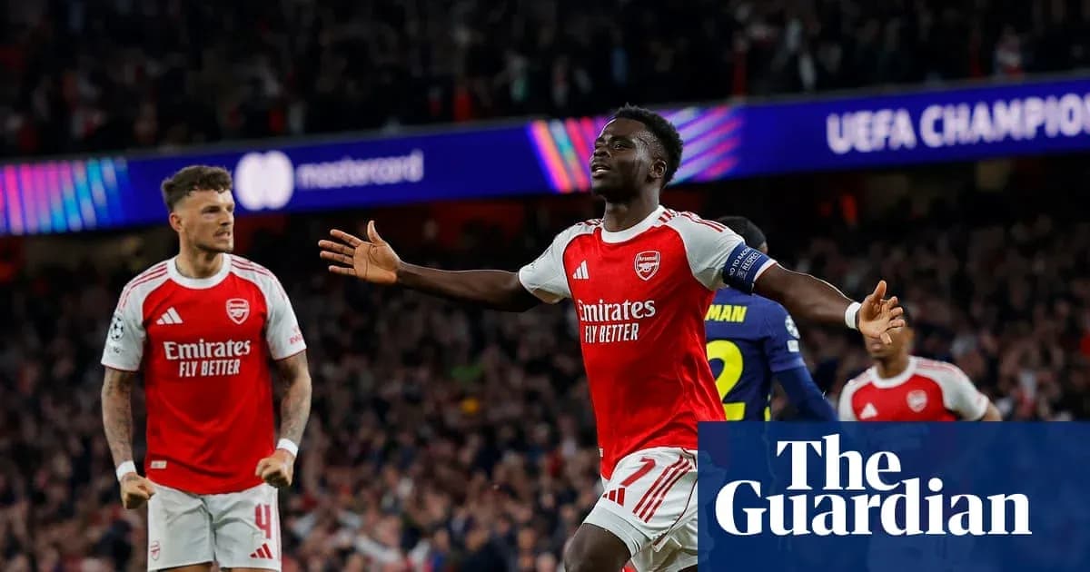 Arsenal players celebrating during UEFA Champions League match