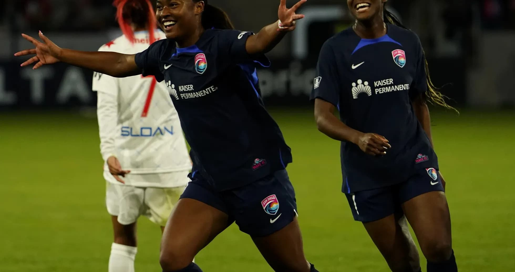 Players celebrating after scoring a goal