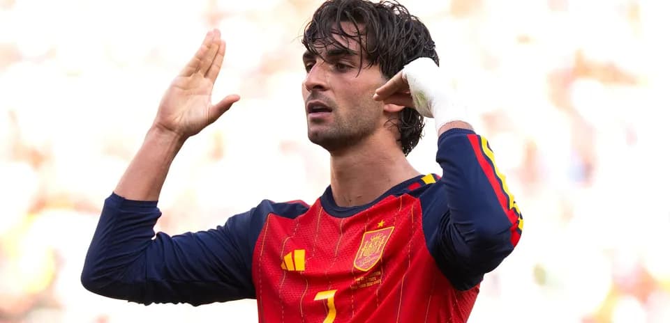 Player gesturing during a match in Spain jersey
