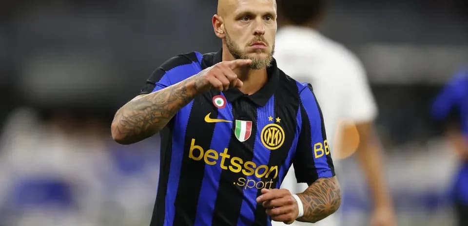 Player celebrating while wearing Inter Milan jersey