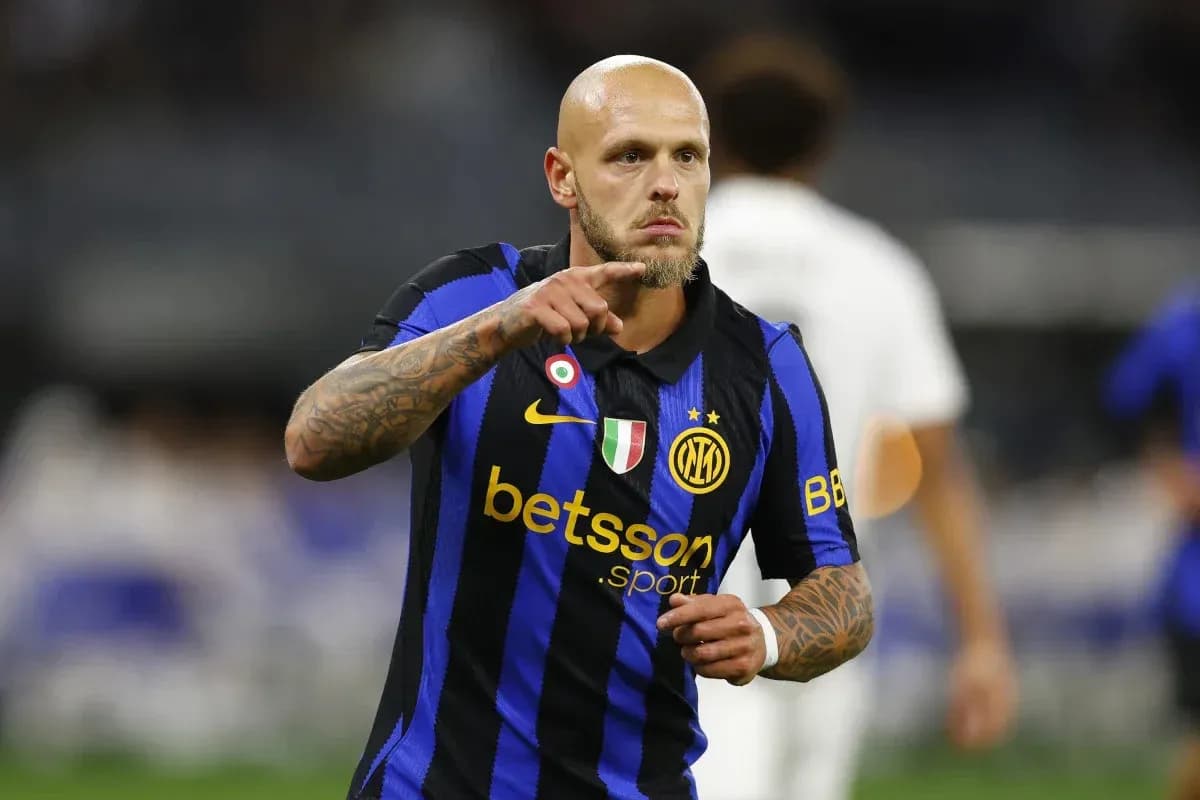 Player celebrating while wearing Inter Milan jersey
