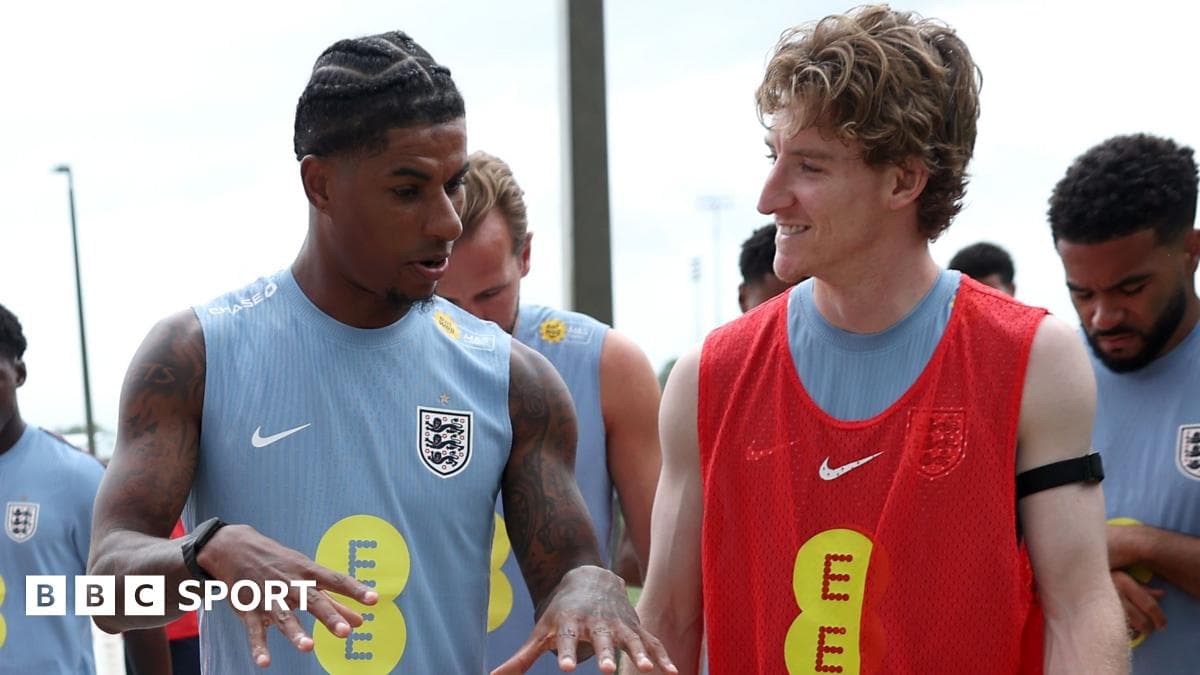 Two players interacting during England training session