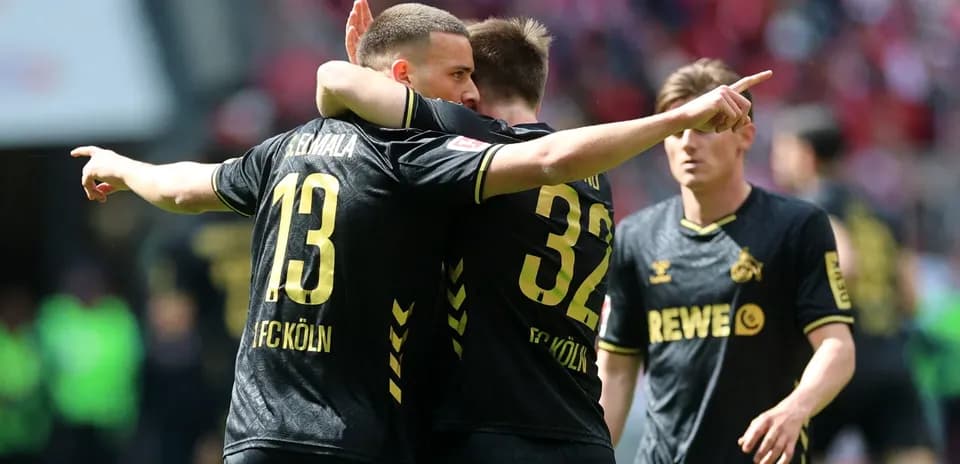 FC Köln players celebrating a goal during match