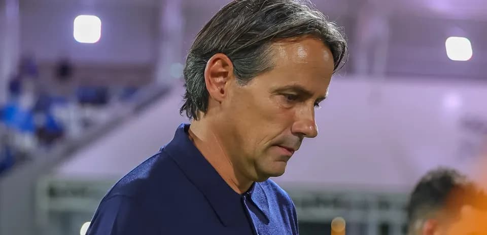 Coach walking on the sidelines during match