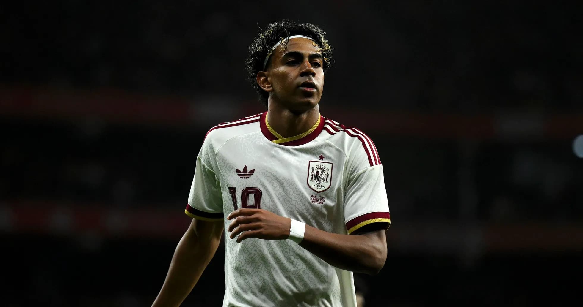 Player wearing Spain jersey during match action