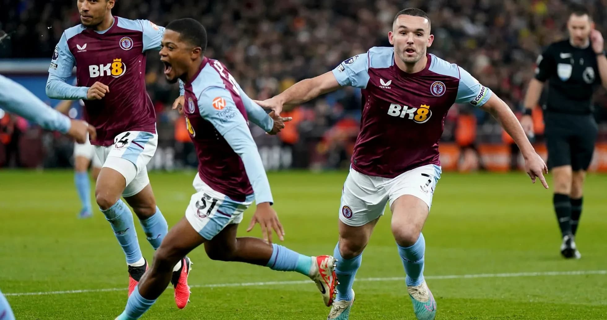 Aston Villa players celebrating a goal