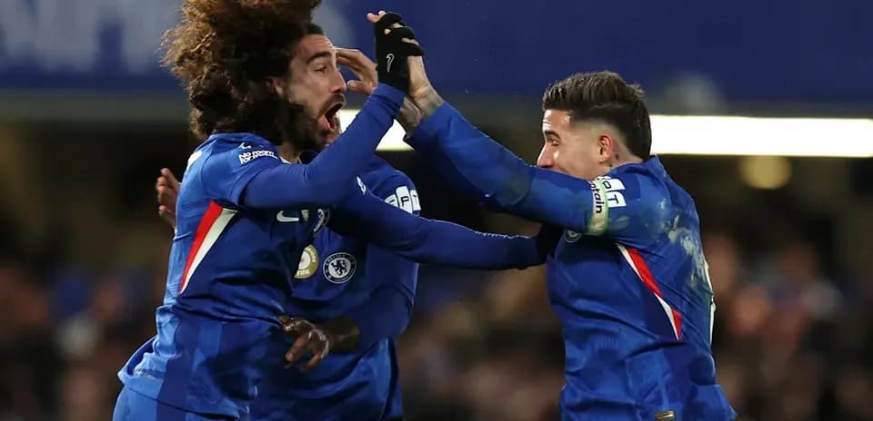 Chelsea players celebrating a goal in match