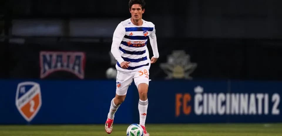 Player running with ball during FC Cincinnati II match