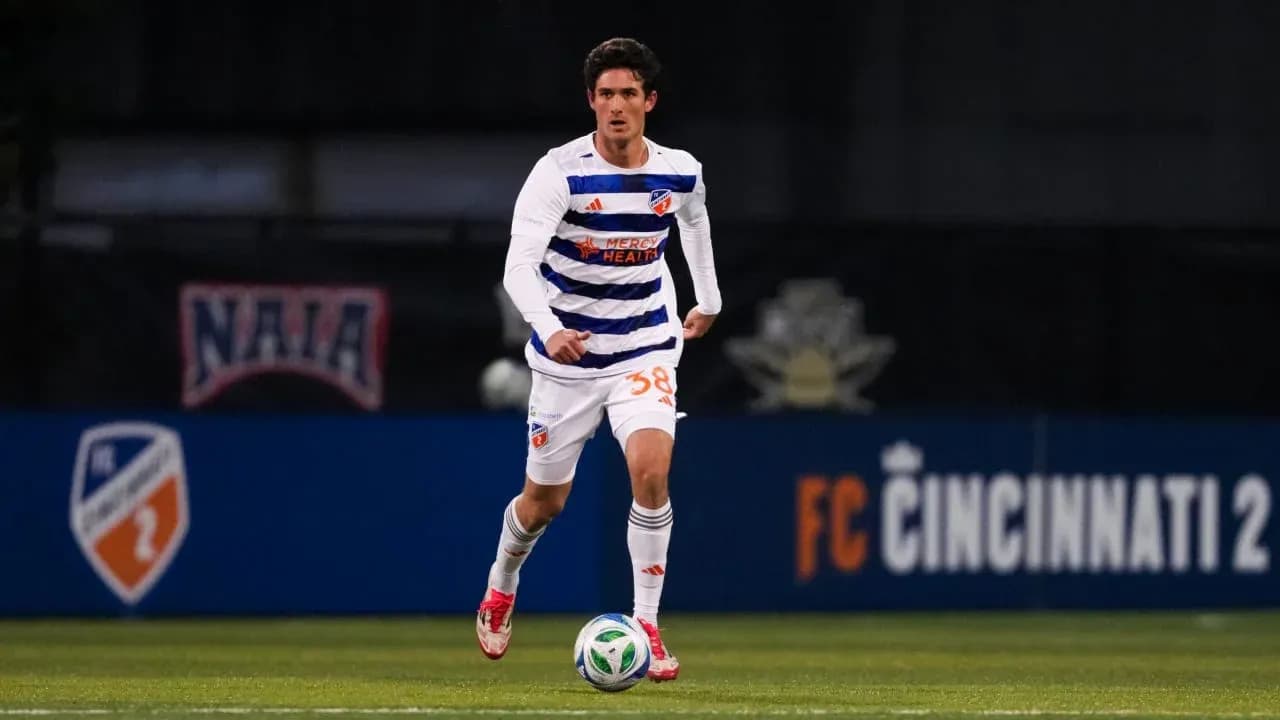 Player running with ball during FC Cincinnati II match