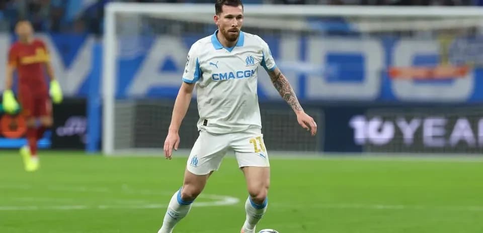 Marseille player controlling the ball during match