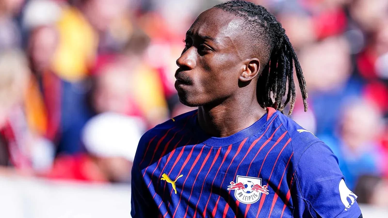 Player in RB Leipzig kit during match warm-up