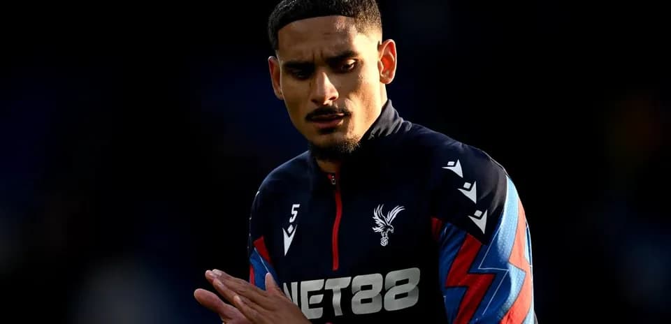 Player wearing Crystal Palace kit during warm-up