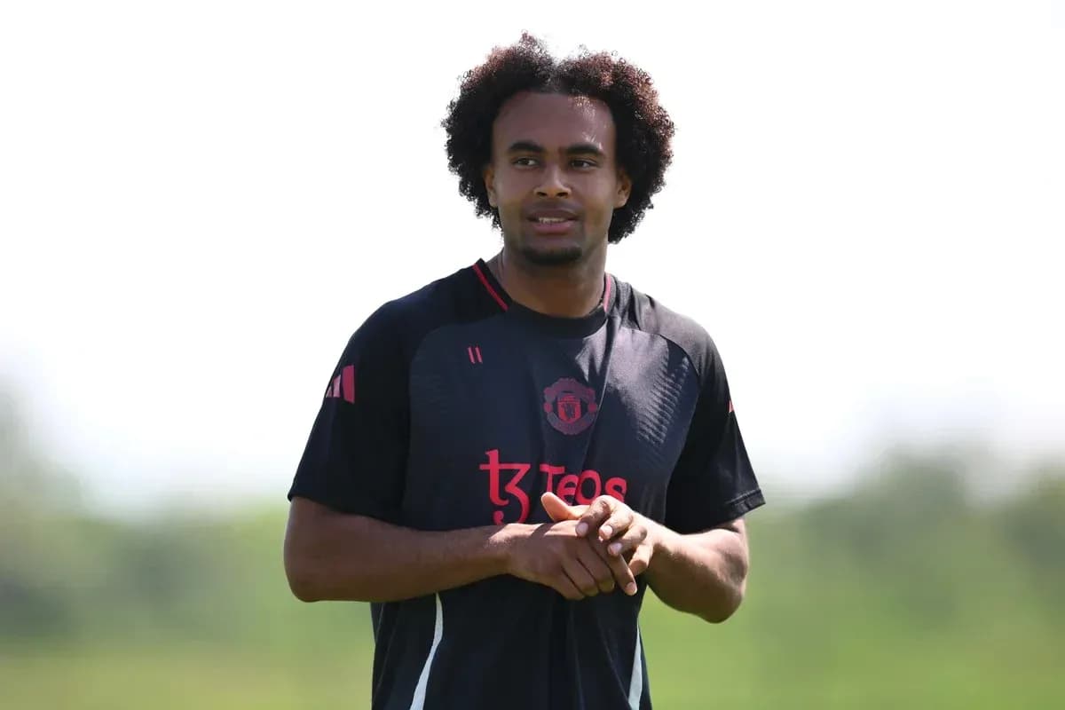 Player in Manchester United training kit outdoors