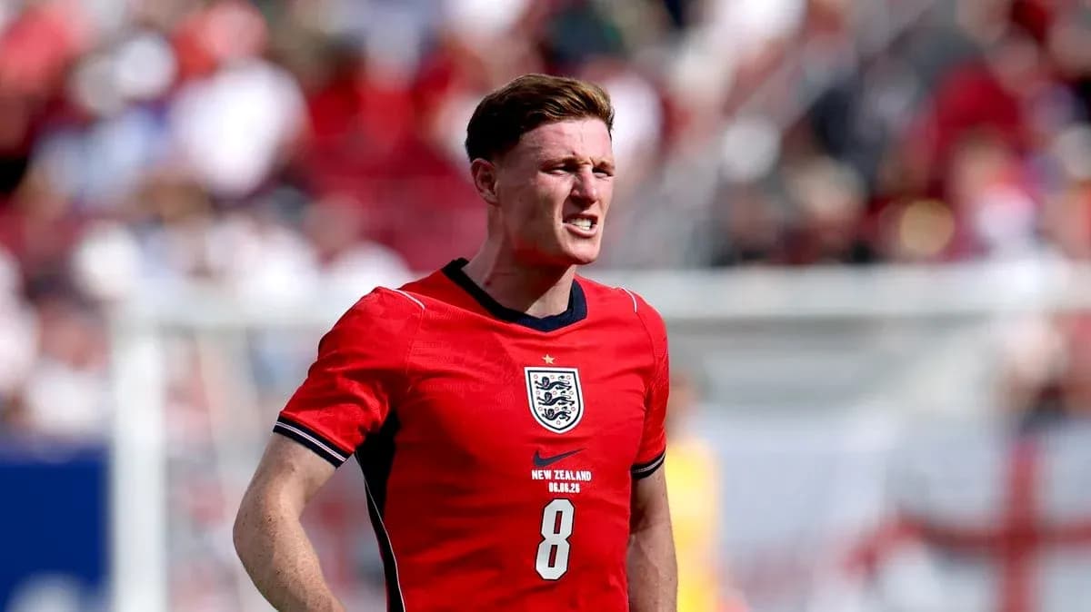 Player in red England jersey during match