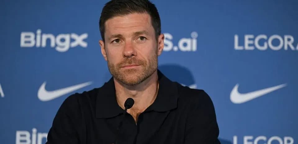 Manager at press conference with microphone