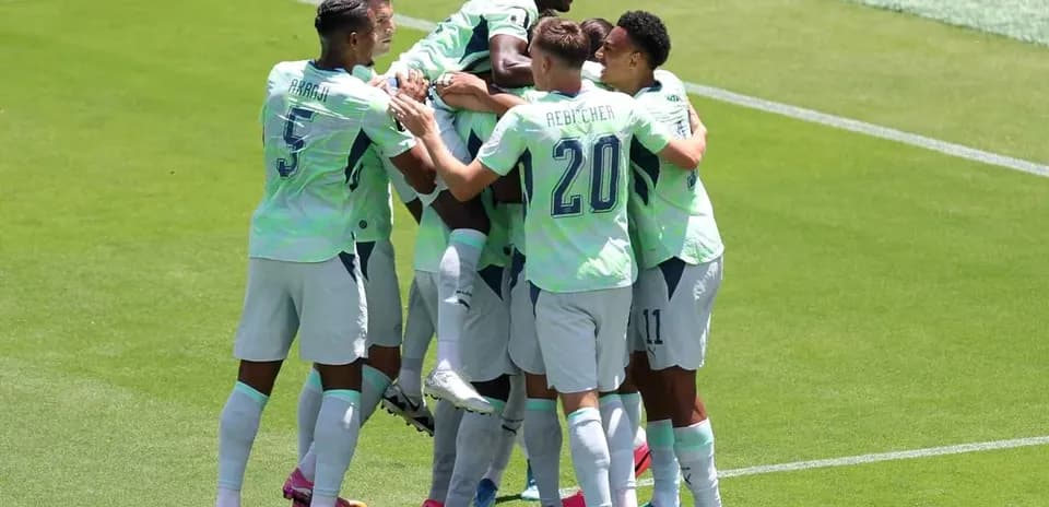 Players celebrating a goal during Qatar match