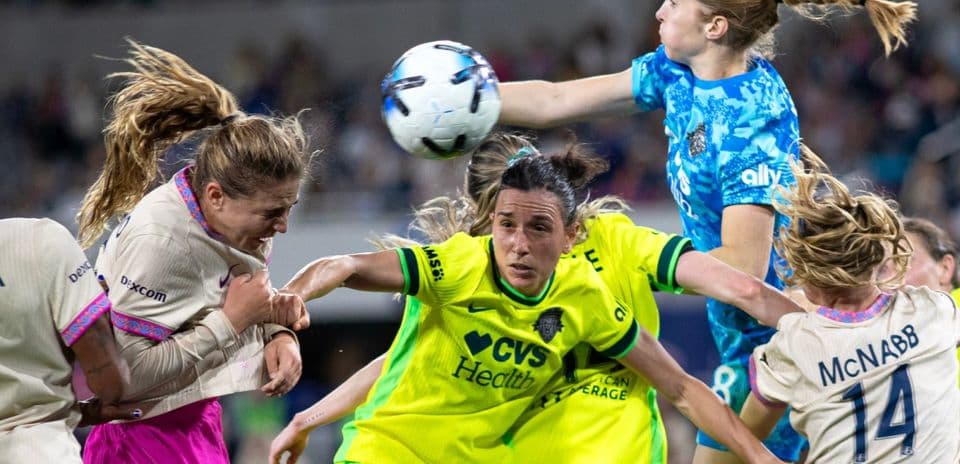 Players competing for the ball during match action