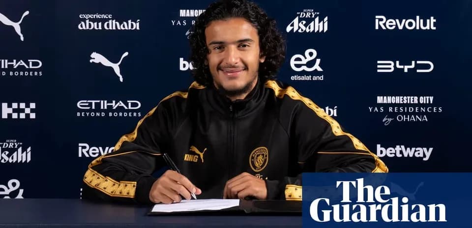 Player signing contract at Manchester City announcement