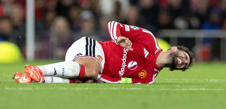 Player lying on the field in pain during match
