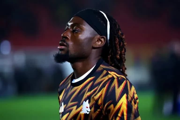Football player in colorful jersey on field