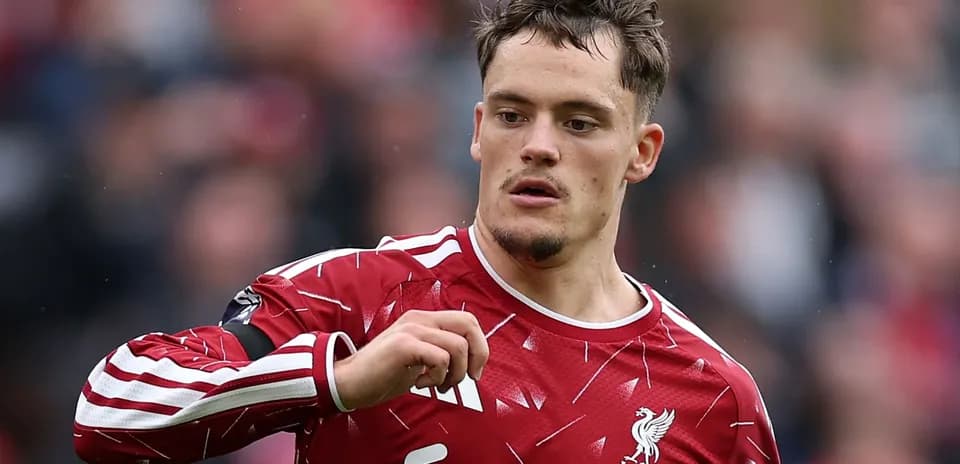Player in Liverpool kit during match action