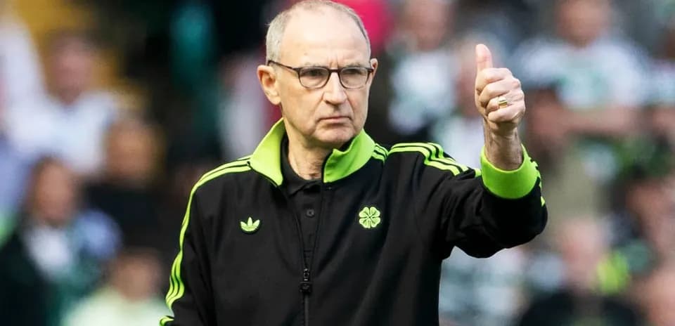 Coach giving thumbs up during match