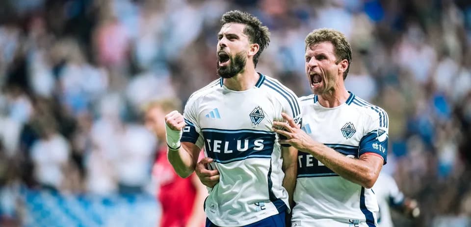 Vancouver Whitecaps players celebrating a goal