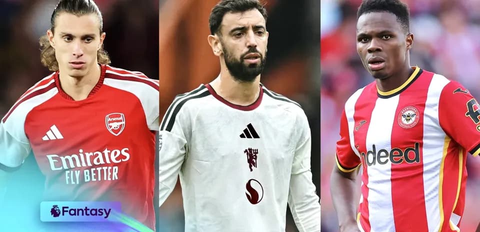 Three football players in club jerseys during match