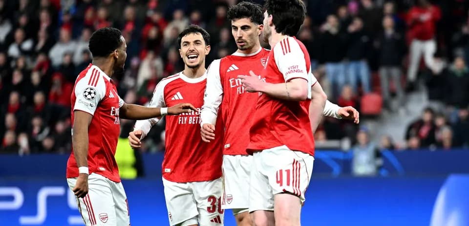 Arsenal players celebrating during UEFA Champions League match