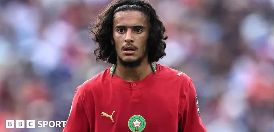 Moroccan player in red jersey during match