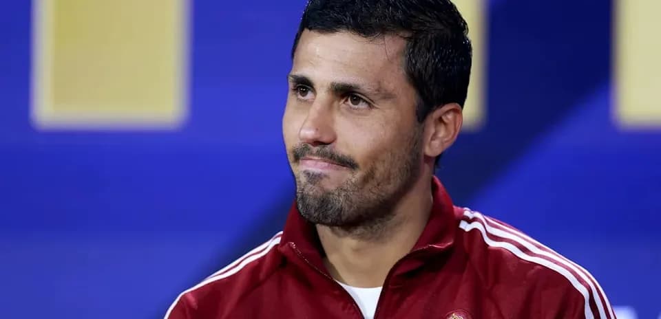 Football player in Spain team tracksuit during interview