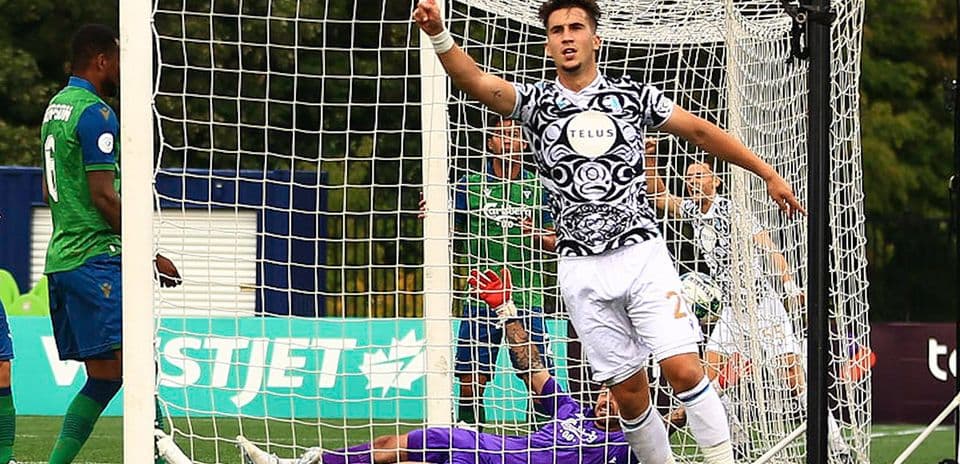 Player celebrating goal during Pacific FC match