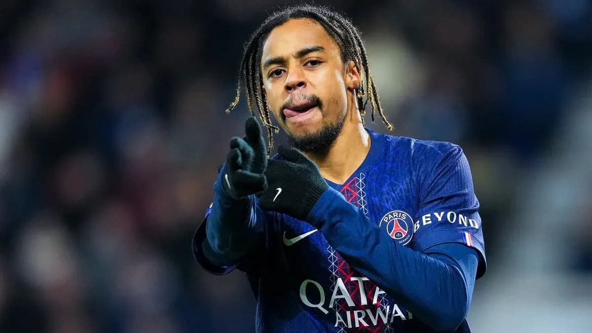 Player gesturing during match in PSG jersey