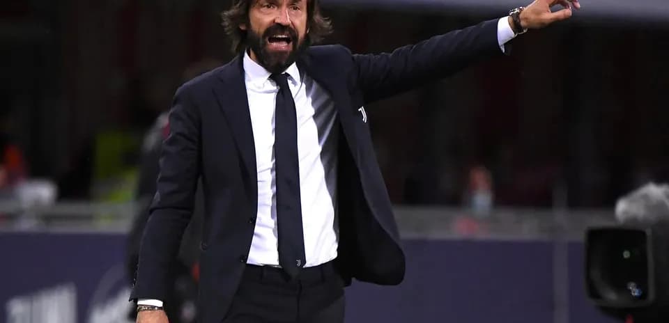 Coach gesturing during a match from the sidelines