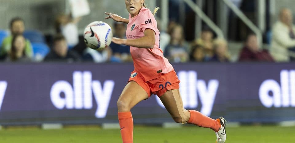 Player running with ball during match