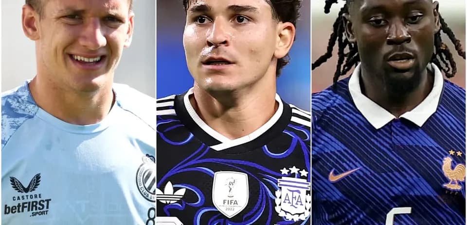 Three soccer players in different team jerseys