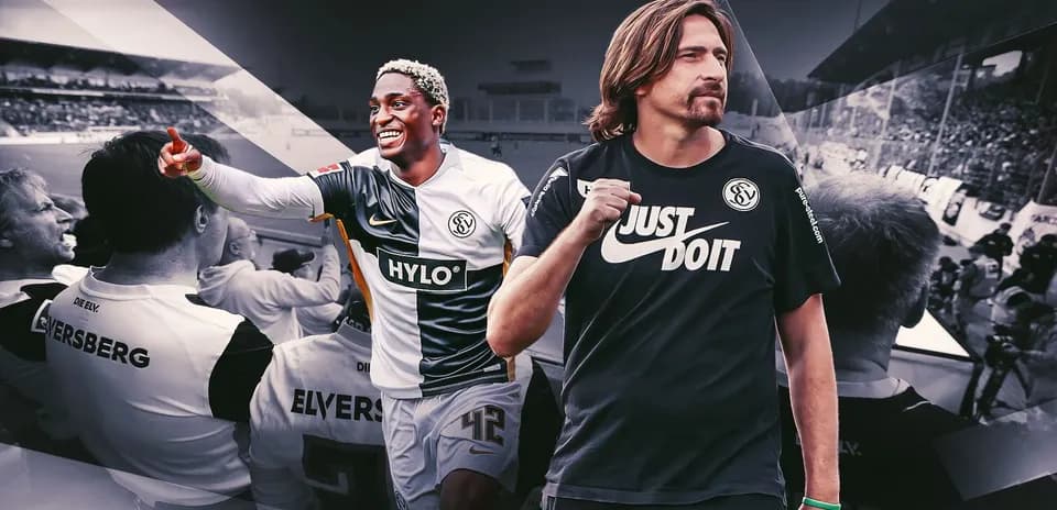 Two players celebrating with fans in background