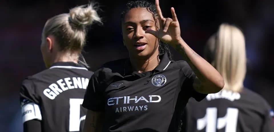 Player gesturing during match with teammates behind